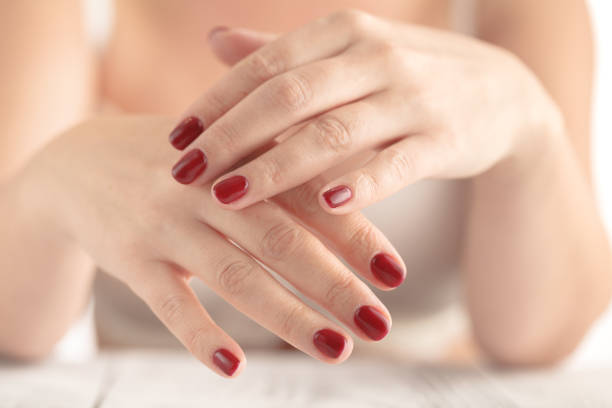 istock Young beauty with red painted nails, very relaxed 851000314