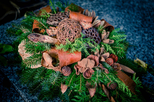 istock floral decoration on tomb i cemetery during All saints day 851001146