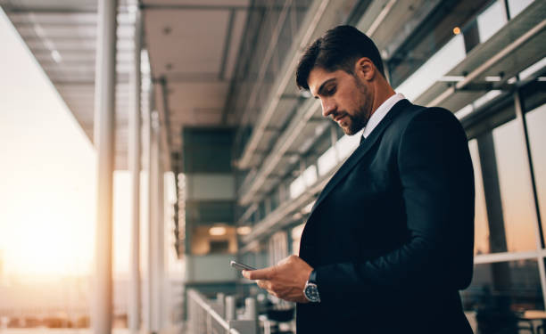 istock Business executive waiting for his flight at airport 851007808