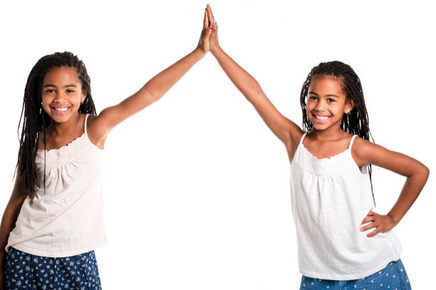 istock Two Adorable african twin girl on studio white background 851008052