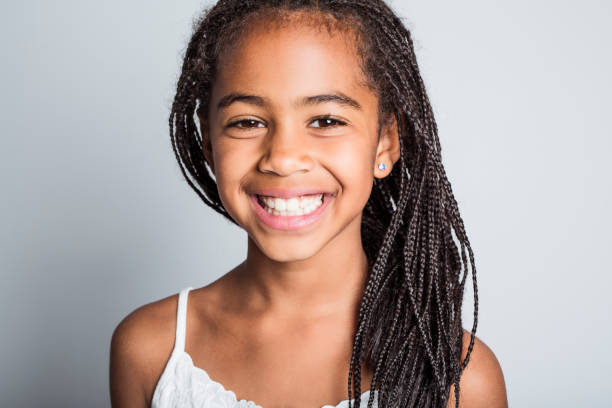 istock Adorable african little girl on studio gray background 851008944