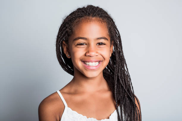 istock Adorable african little girl on studio gray background 851011464