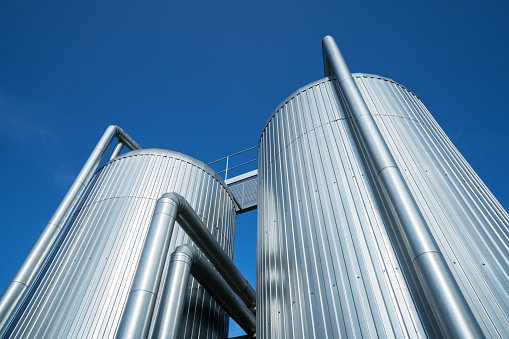 Heat storage tanks with the blue sky in the background
