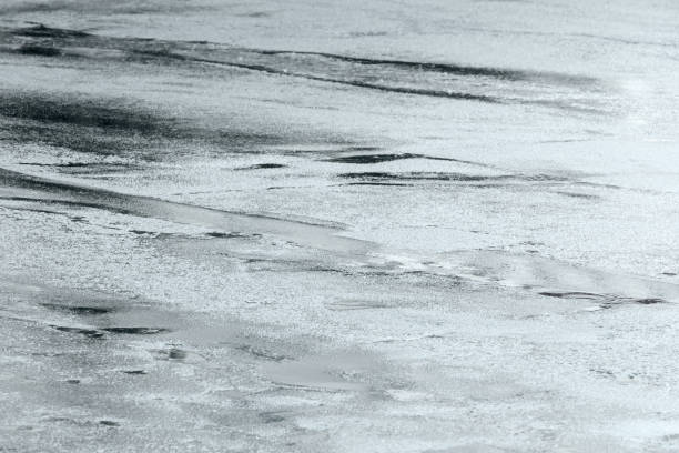 istock urban asphalt road wet after heavy rain 851011834