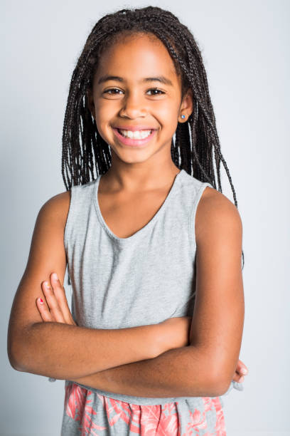 istock Adorable african little girl on studio gray background 851012656