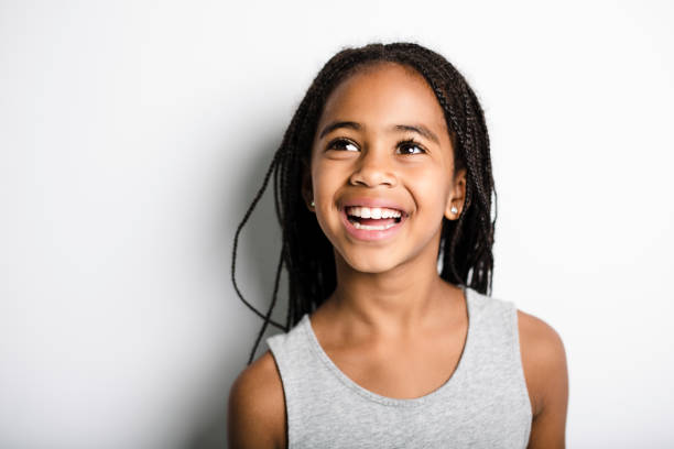 istock Adorable african little girl on studio gray background 851014918