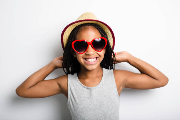 istock Adorable african little girl on studio gray background 851016320