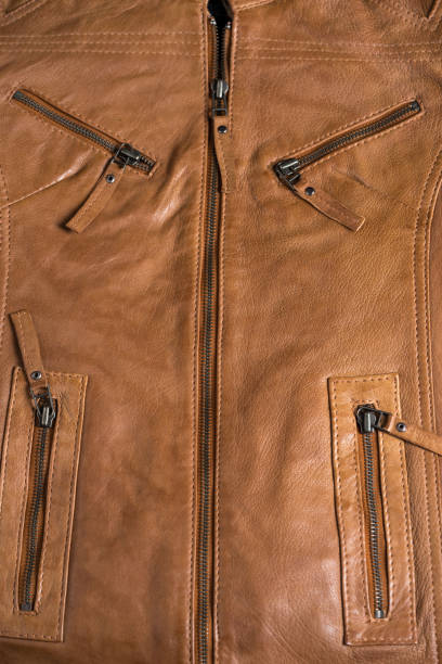 istock Light brown leather jacket. Beige color leather jacket on hanger 851024474