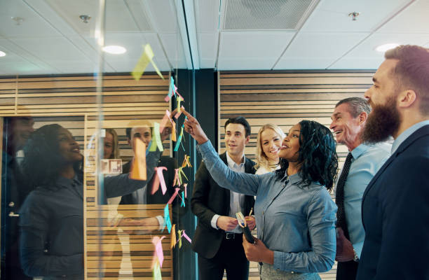 istock Cheerful entrepreneur team talking in the office 851025660