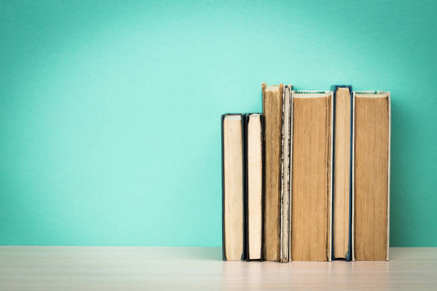 istock Old books on a wooden shelf 851049398