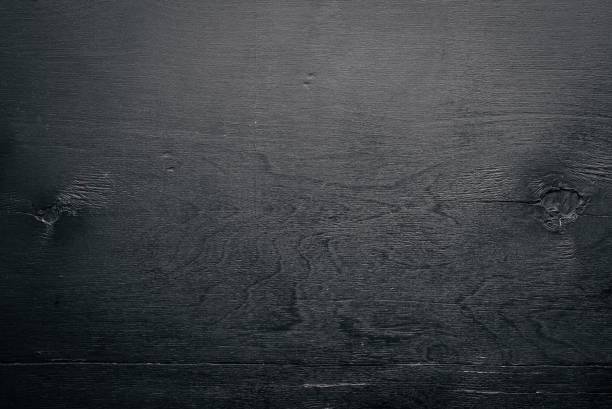 istock Black textured wooden background. Top view. Free space for text. 851054292