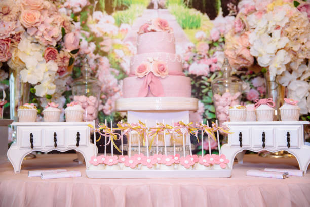 istock Candy bar and wedding cake. Table with sweets, buffet with cupcakes, candies, dessert. 851057380