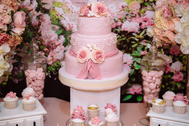 istock Candy bar and wedding cake. Table with sweets, buffet with cupcakes, candies, dessert. 851057446