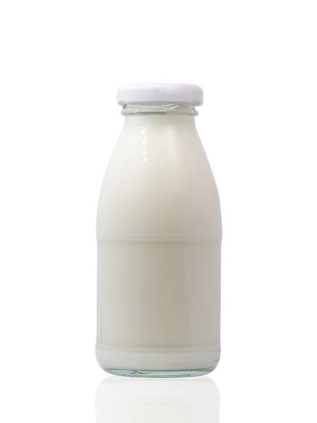 istock glass bottle full of milk on white background 851057452