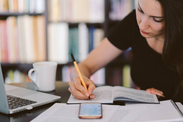 istock Woman reading and working at home 851057566