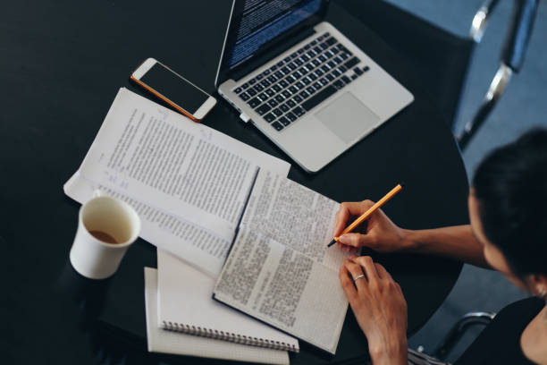 istock Woman reading and working at home 851058030