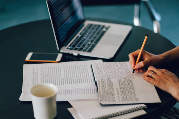 istock Woman reading and working at home 851094486