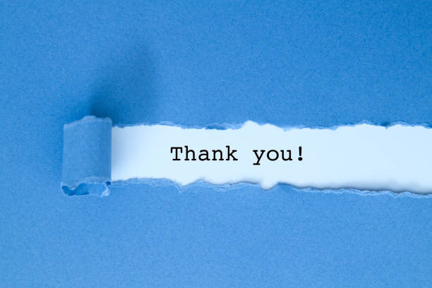 Thank you message written under blue torn paper.
