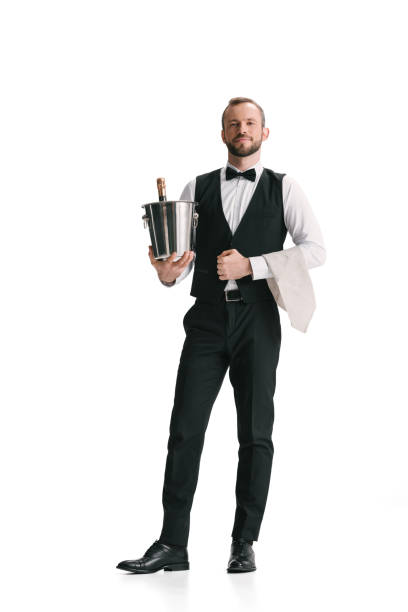 istock waiter with bottle of champagne 851102456