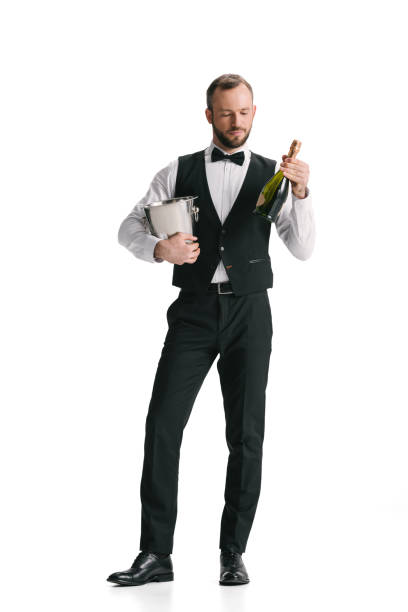 istock waiter with bottle of champagne 851102596