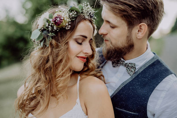 istock Beautiful bride and groom in green nature. 851102670