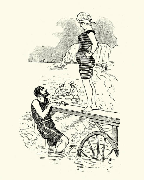 Victorian man and woman diving into the sea, 1880s Vintage engraving of a Victorian man and woman diving into the sea, 19th Century victorian swimwear stock illustrations