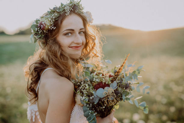 istock Beautiful young bride at sunset in green nature. 851102894