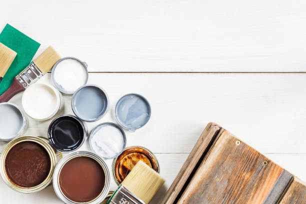 istock Open Cans of Different Paints, Varnish and Stain 851103808