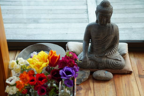 istock Buddha incense and flowers 851106264