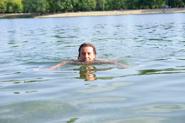istock Swimming in the lake 851106268