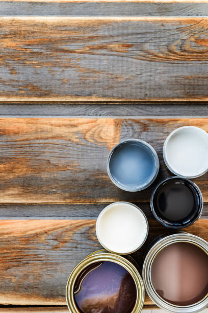 istock Open Cans of Different Paints, Varnish and Stain 851106746