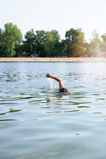 istock Swimming in the lake 851107646