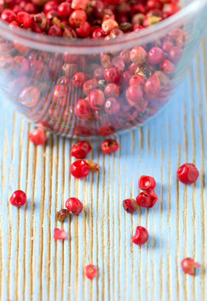 istock red peppercorns on wooden table 851110648