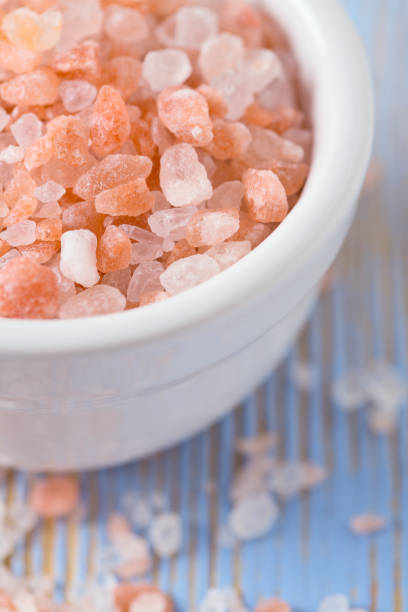 istock himalayan pink salt on wooden surface 851110706