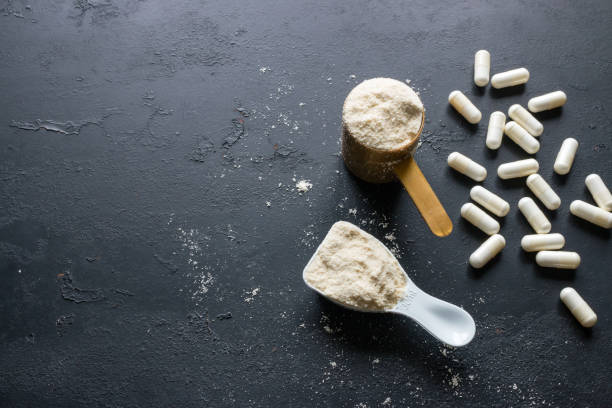 istock sports supplements on a black background with space for text 851155464