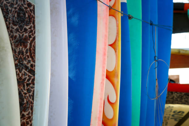 istock Stack of colorful surfboards ready for rent on the beach 851156158