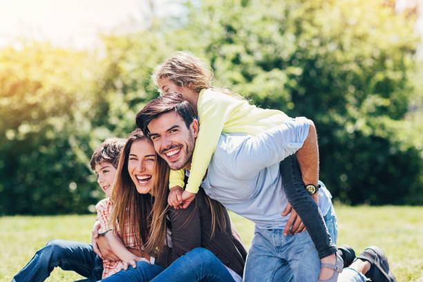 istock Happy young family in the park 851159938