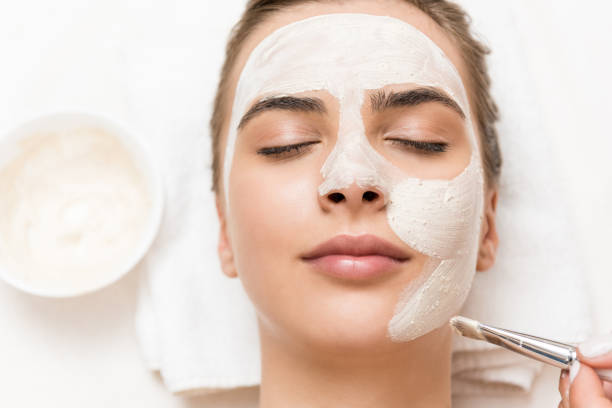 istock woman with facial mask 851168658