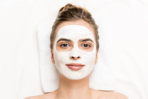 istock woman with facial mask 851169270