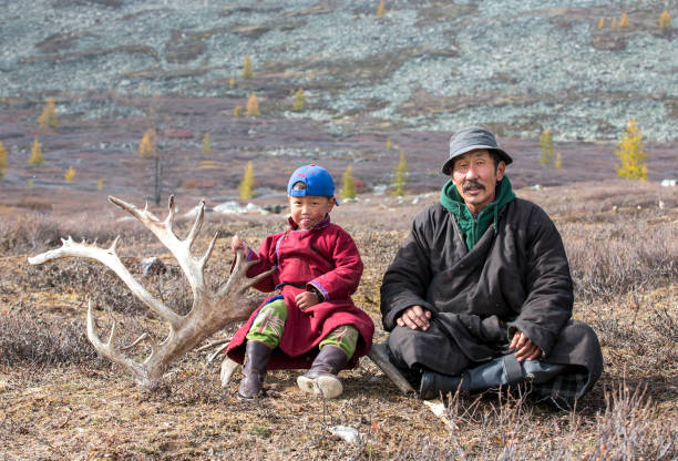 Tolbo, Mongolia - September 12, 2024: A Kazakh family raises sheep and goats. The family lives in traditional tents.