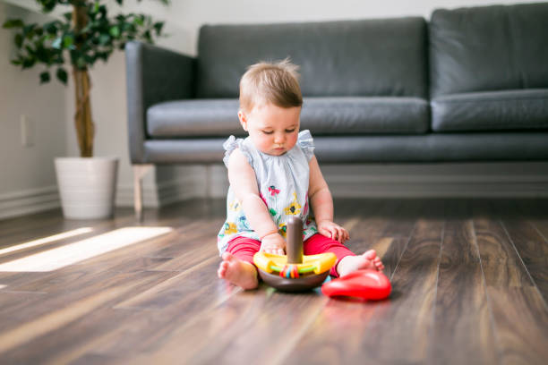 istock Happy kid playing toy at home 851173720