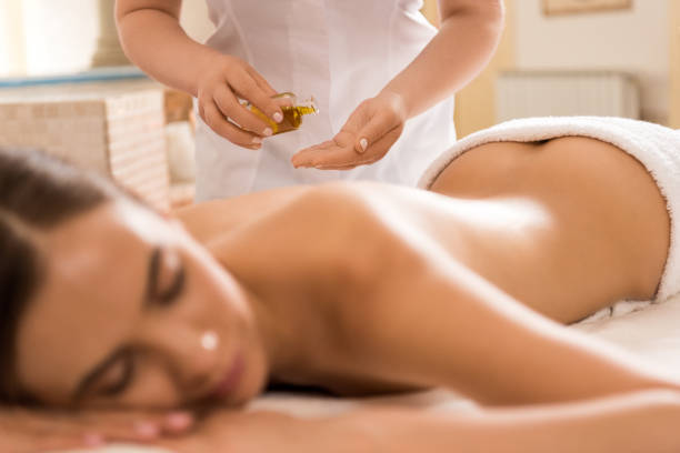 istock massage therapist with body oil 851176672
