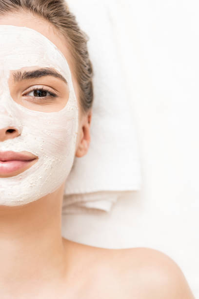 istock woman with facial mask 851177064