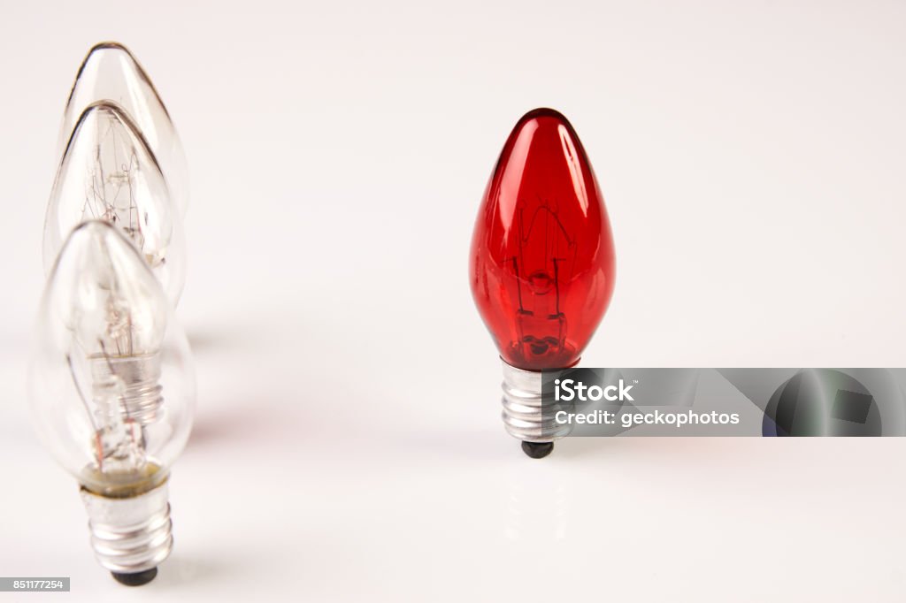 Light bulbs. Big idea concept Light bulbs. Big idea concept, Bright Creative and Leadership concept with one red lamp many different glass light bulbs on white background. Azerbaijan Stock Photo
