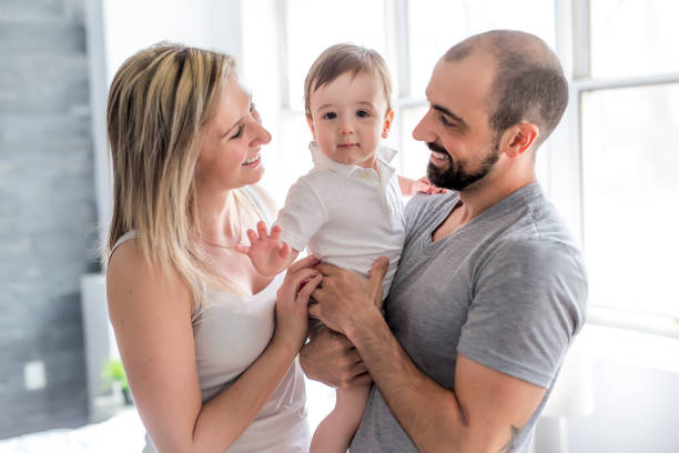 istock nice Happy and fun family in bedroom 851181414