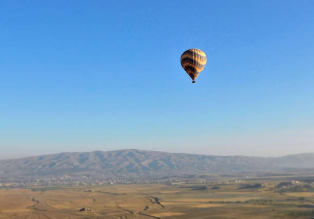 istock colorful air balloon and beautiful landscape 851211356
