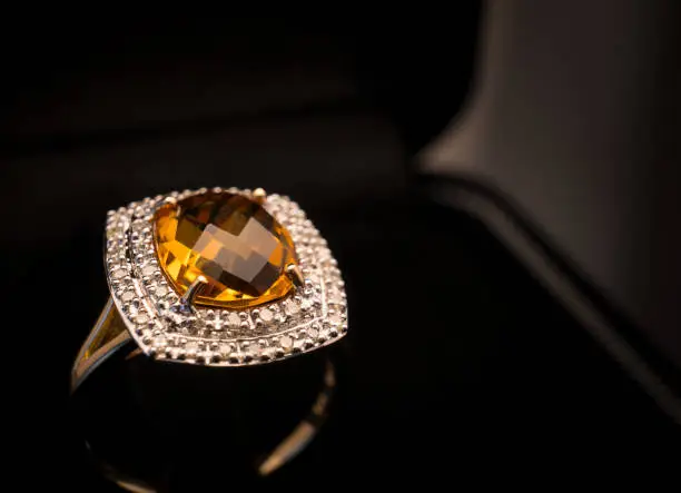 Jewel gemstone ring on shine table