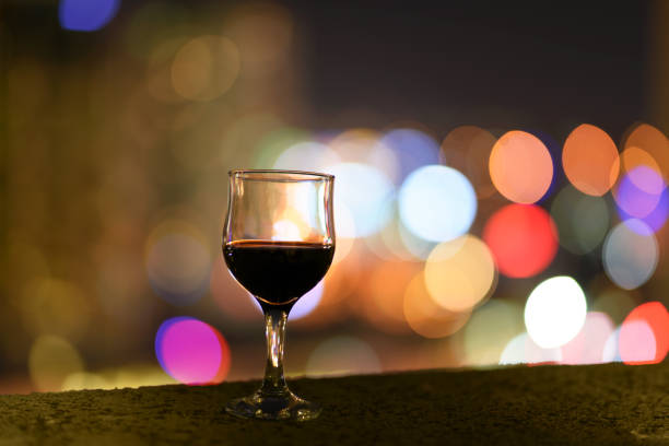 istock Red Wine And City Lights 851229284