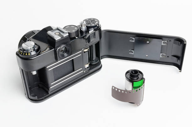istock Retro photo camera 35mm with an open rear cover 851234562
