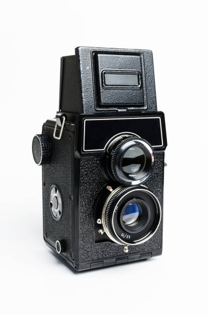 Retro photo camera on a white background
